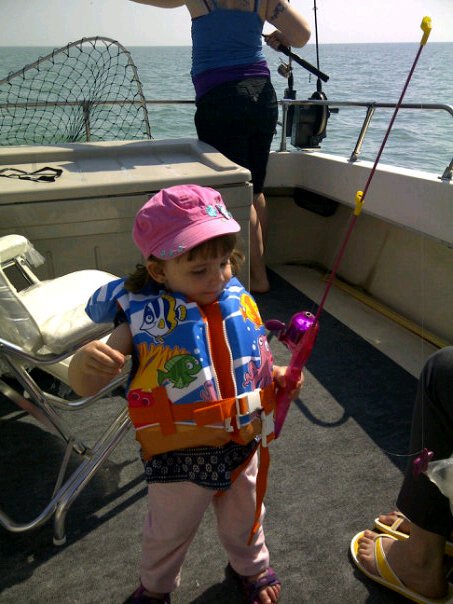 Addison all ready for fishing on Grampa Chuck's Fishing Charters on Lake Erie